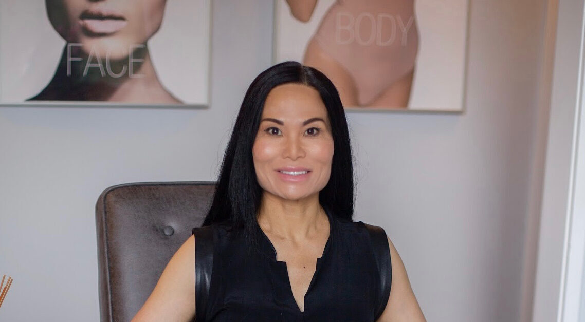 This image shows Becky Pfeifer, the owner of Fabesthetics smiling